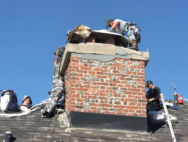 Walnut Chimney Sweep installing a custom chimney crown in Walnut, CA